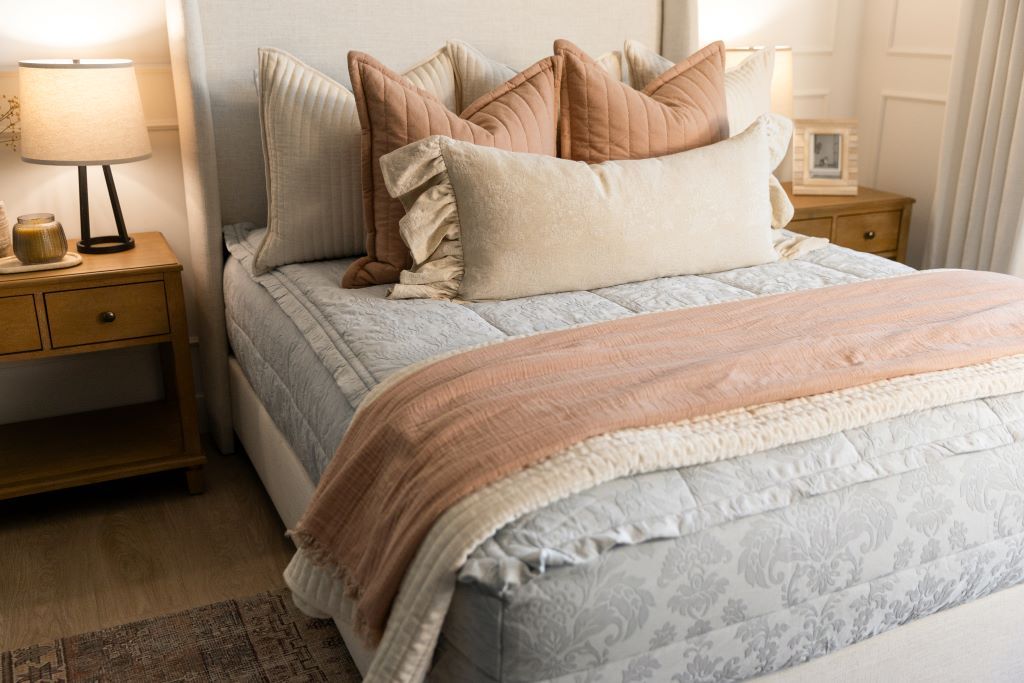 Light blue floral zipper bedding with cream and terracotta accessories