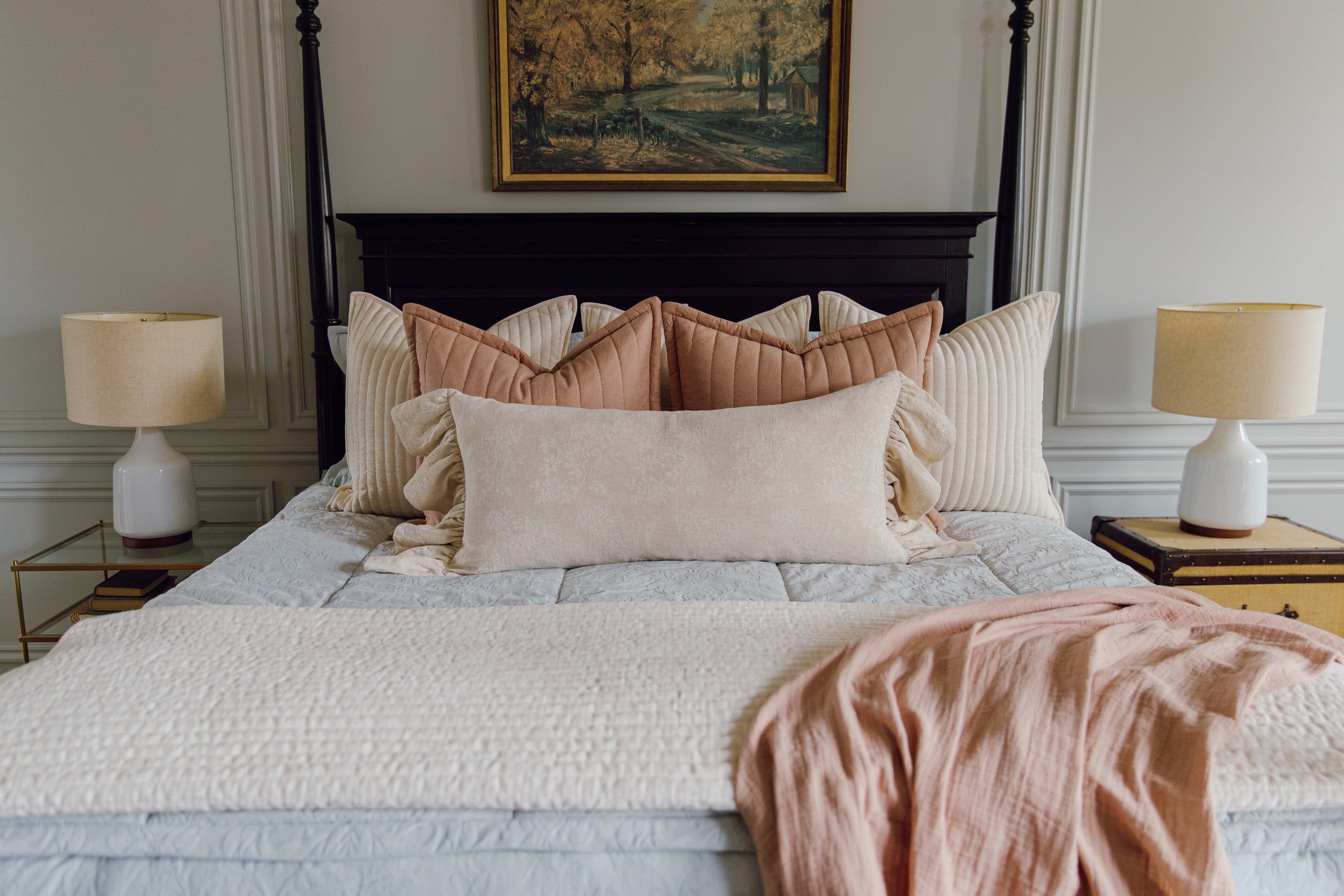 Blue embossed floral bedding with cream and terracotta accessories