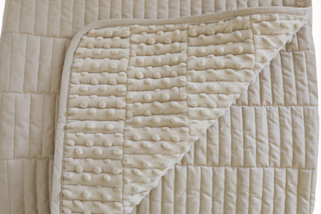 Tan blanket with minky interior