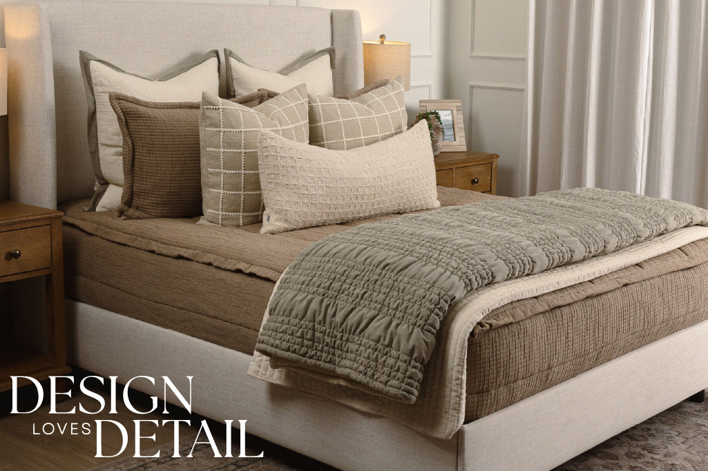 Soft, tan knitted zipper bedding with cream and green accessories.