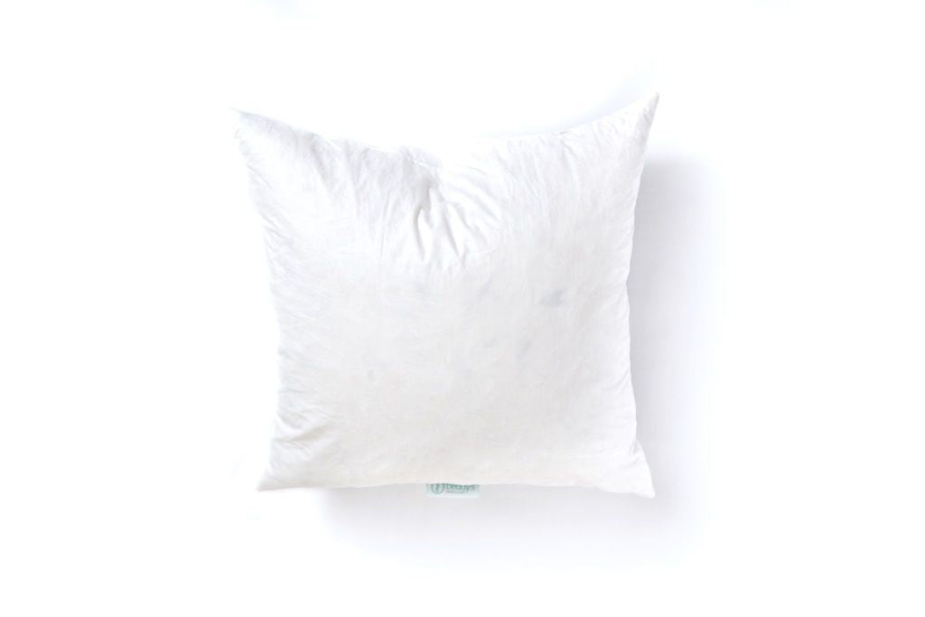 A white feather medium pillow insert.