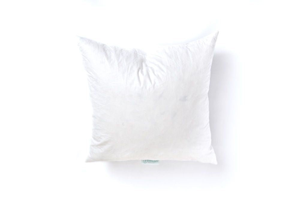 A white medium feather pillow insert.